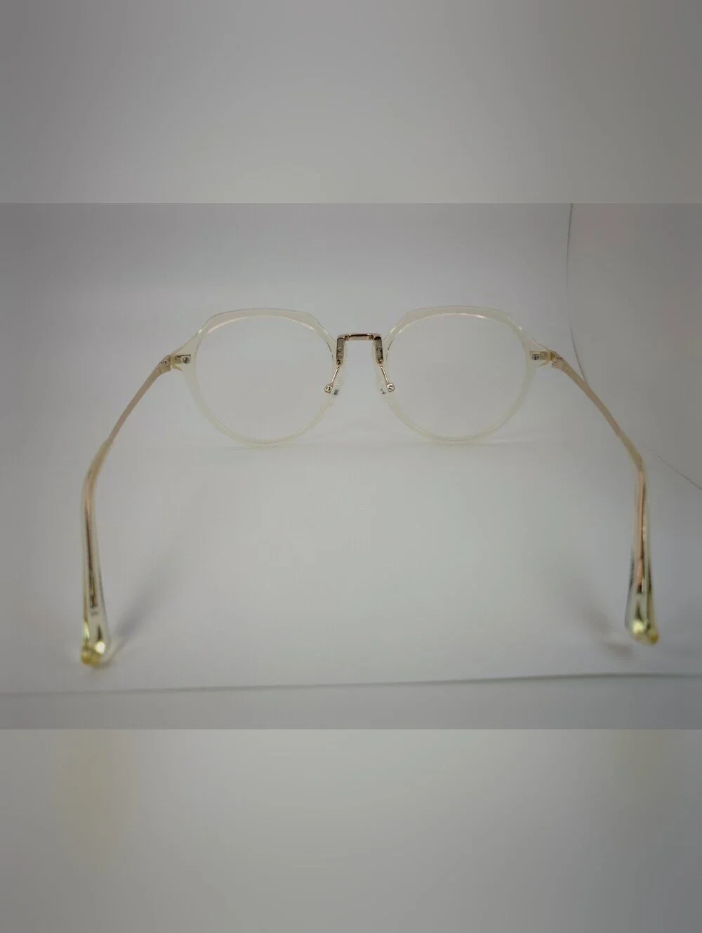 Tamara. Clear Round Frame Glasses with Gold Accents. Nose Pads. Metal Bridge